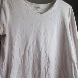 White V neck shirt or undershirt.